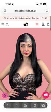 Annabelle Wigs UK Long, black, straight wig with platinum fringe streak and retr